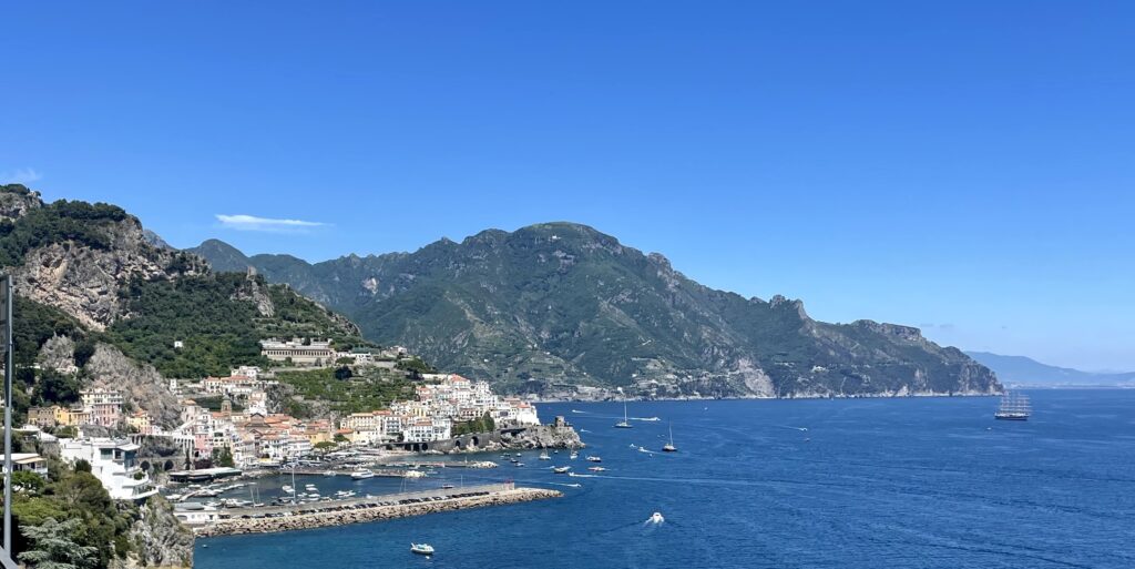 Plan Amalfi Coast trip: view of Amalfi town and coastline from above the harbor