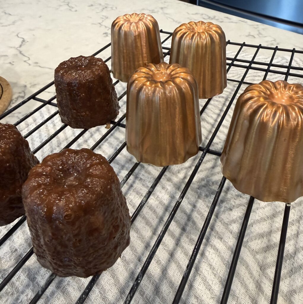 Traditional French canelés baked in copper molds