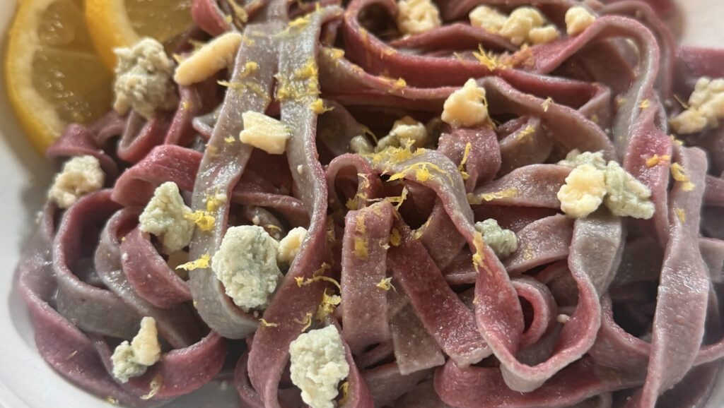 Blue and purple fettuccine made during a pasta class at Angelo's Italian Market
